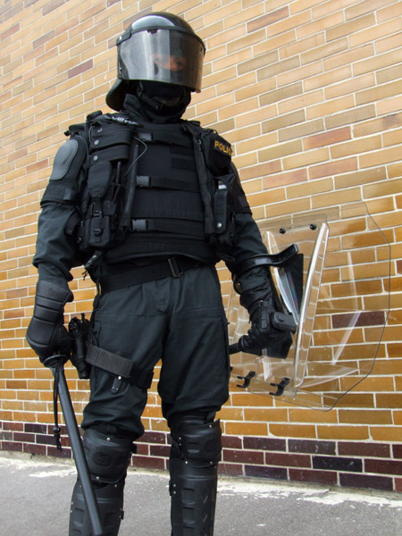 Security-eshop.eu - Police riot shield (held in left hand)